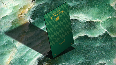 Venetian Rewards Jade tier card on a green marble background.